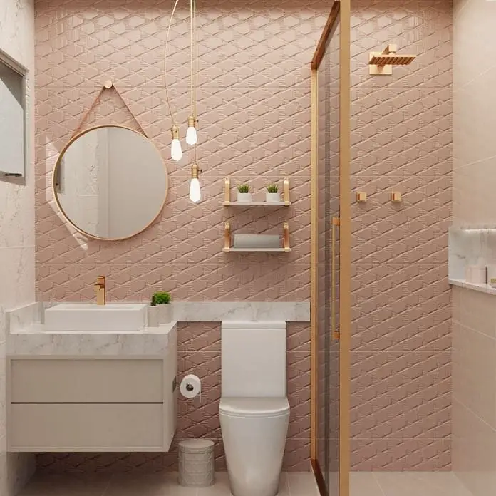 Banheiro pequeno moderno em tons rosa, dourado e branco