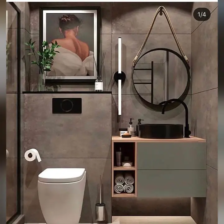 Banheiro com quadro na parede