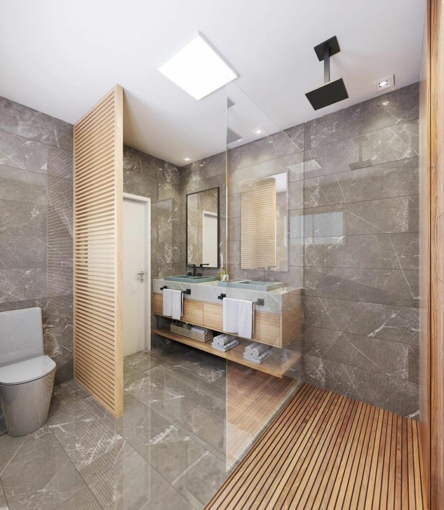 Banheiro com revestimento igual nas paredes e piso