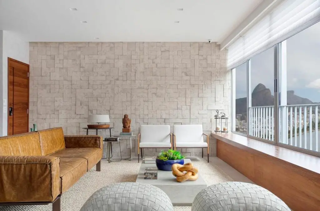 Sala de estar moderna decorada de forma contida, simples e sofisticada 
