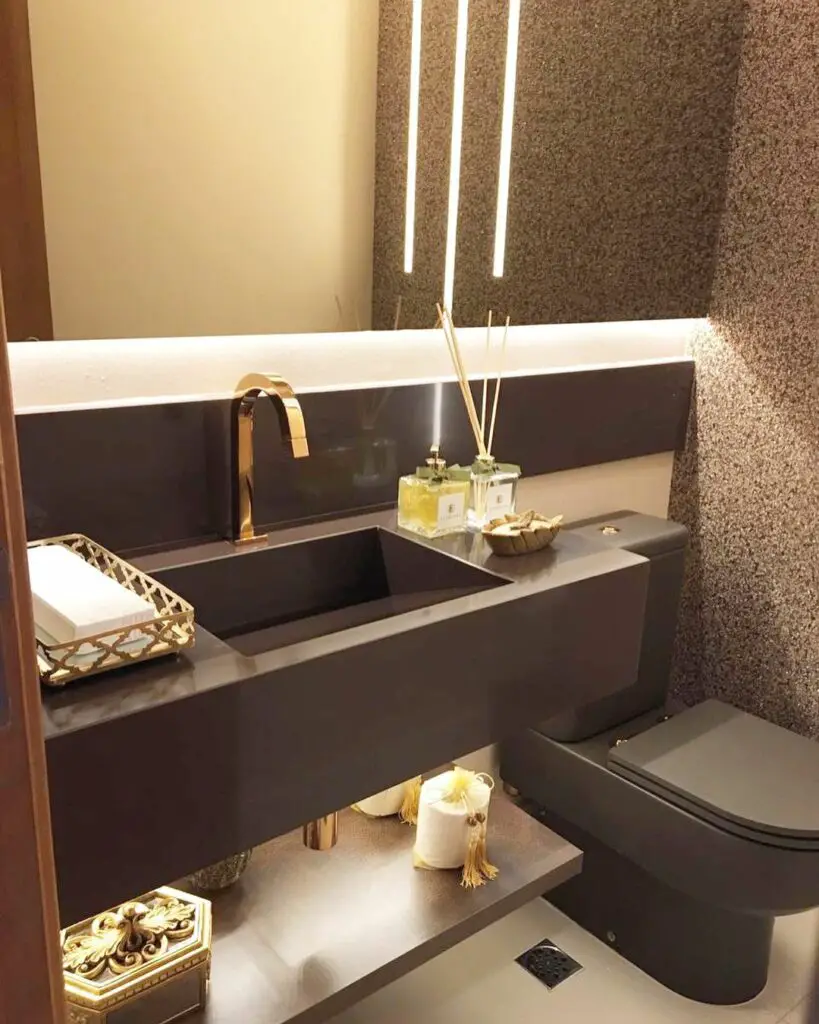 Banheiro elegante com lavabo em granito marrom