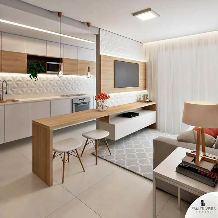 Sala pequena decorada combinando a decoração com a cozinha integrada