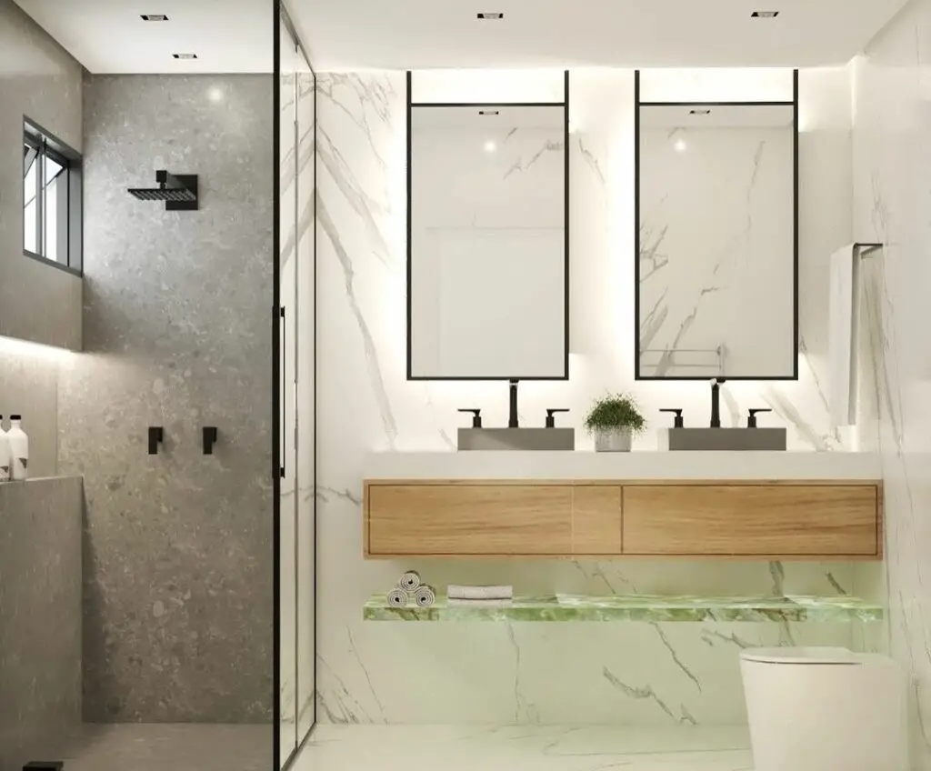 banheiro moderno em tons claros e bem iluminado