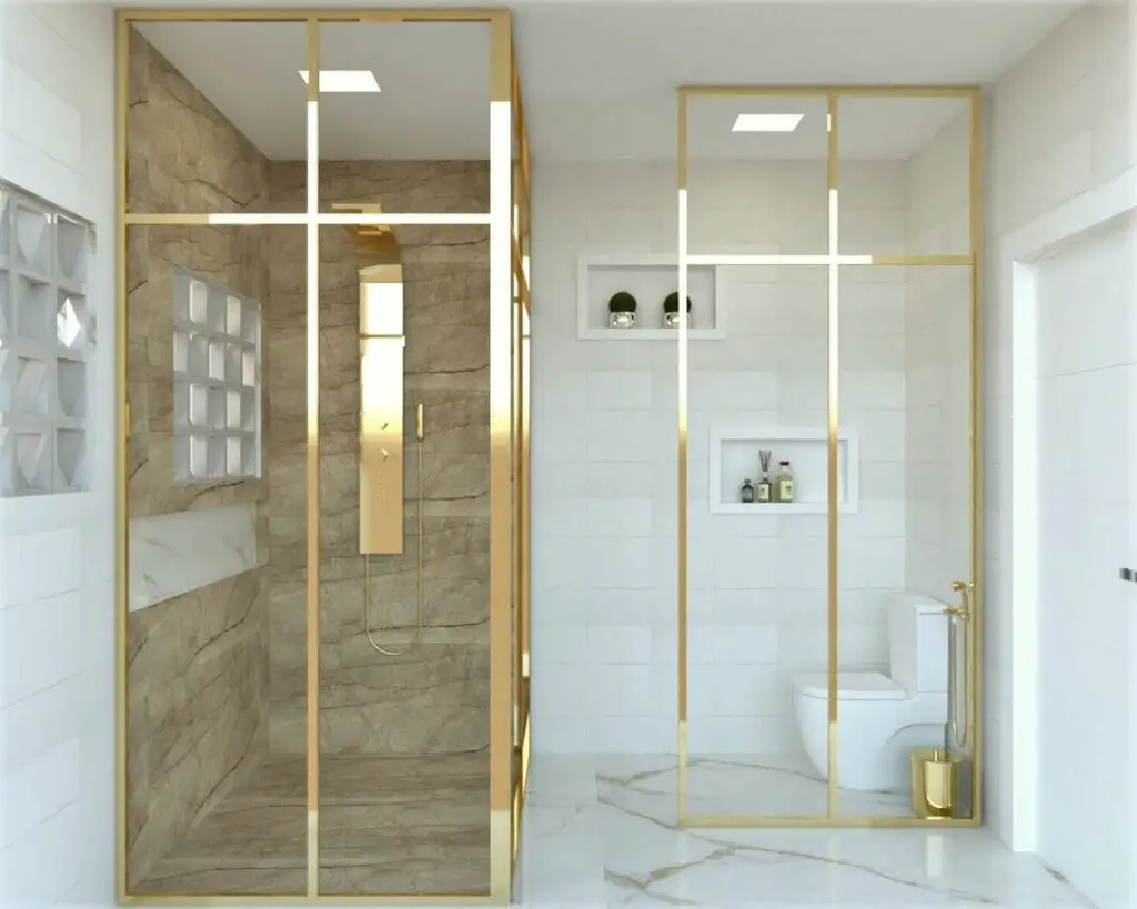 banheiro moderno com detalhes em dourado