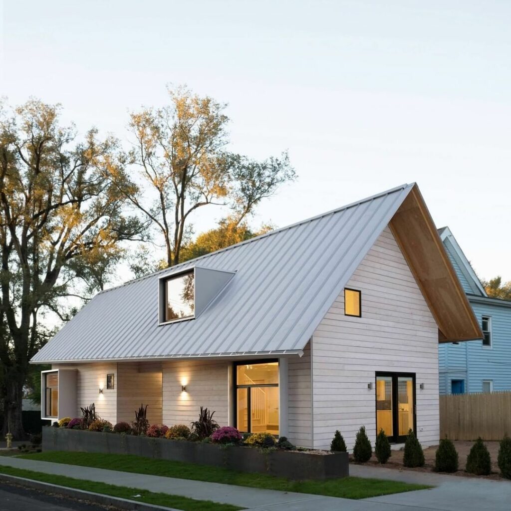 Modelo de casa simples e bonita com telhado de 2 águas