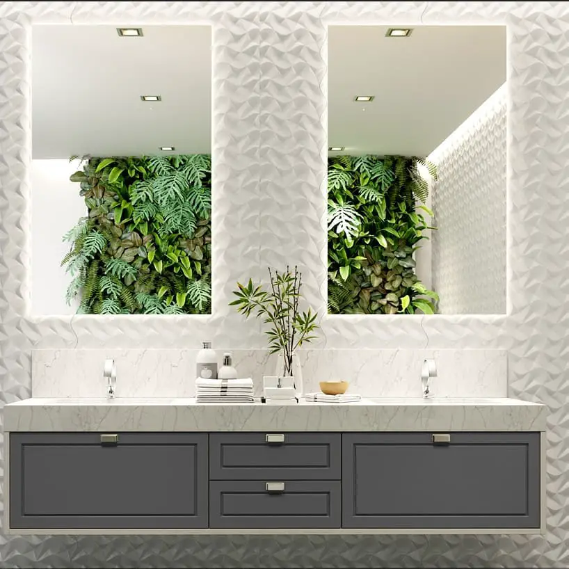 Banheiro com parede verde e armários planejados 